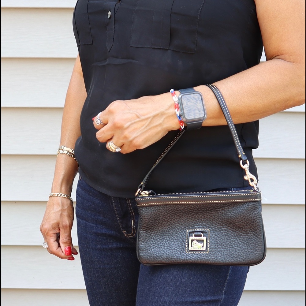 Dooney &Bourke black leather wristlet.